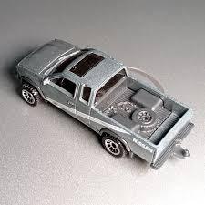 Matchbox Nissan Hardbody D21 Plata – Diecast Camioneta 1:64 | 15/100